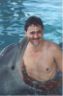 Dolphin kissing Reid.JPG (28721 bytes)